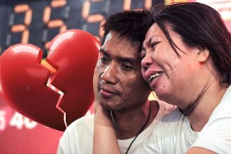 Thai couple Ekkachai Tiranarat and Laksana, known for their record-breaking 58-hour and 35-minute kiss, captured during their Guinness World Record attempt in 2013.