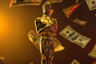 An Oscar statuette, illustrating the 310% increase in net worth experienced by actors who win this prestigious award, as revealed by the Ezra research report.