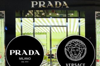 Juxtaposition of the Prada triangle logo and Versace Medusa head, representing a potential acquisition.