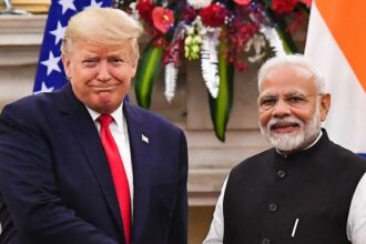 President Donald Trump and Indian Prime Minister Narendra Modi shaking hands during a diplomatic meeting, symbolizing strengthened U.S.-India trade relations.